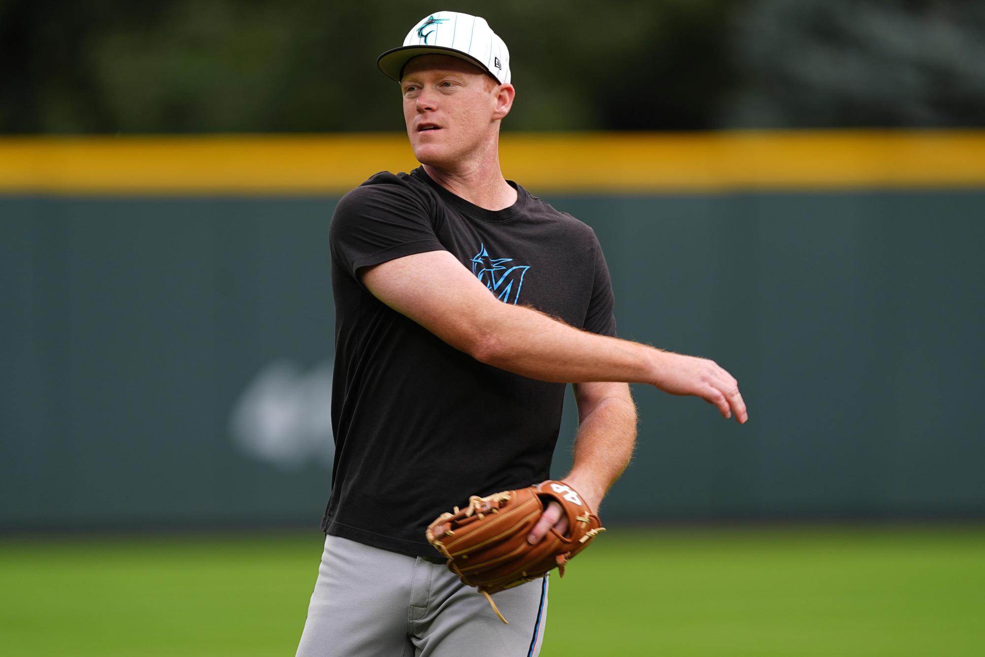 Marlins-Twins_Trade_Baseball_13300 FILE – Miami Marlins first baseman Eric Wagaman (33) warms up before a baseball game Wednesday, Sept. 17, 2025, in Denver. (AP Photo/David Zalubowski, File)